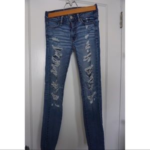 High rise distressed jeans.